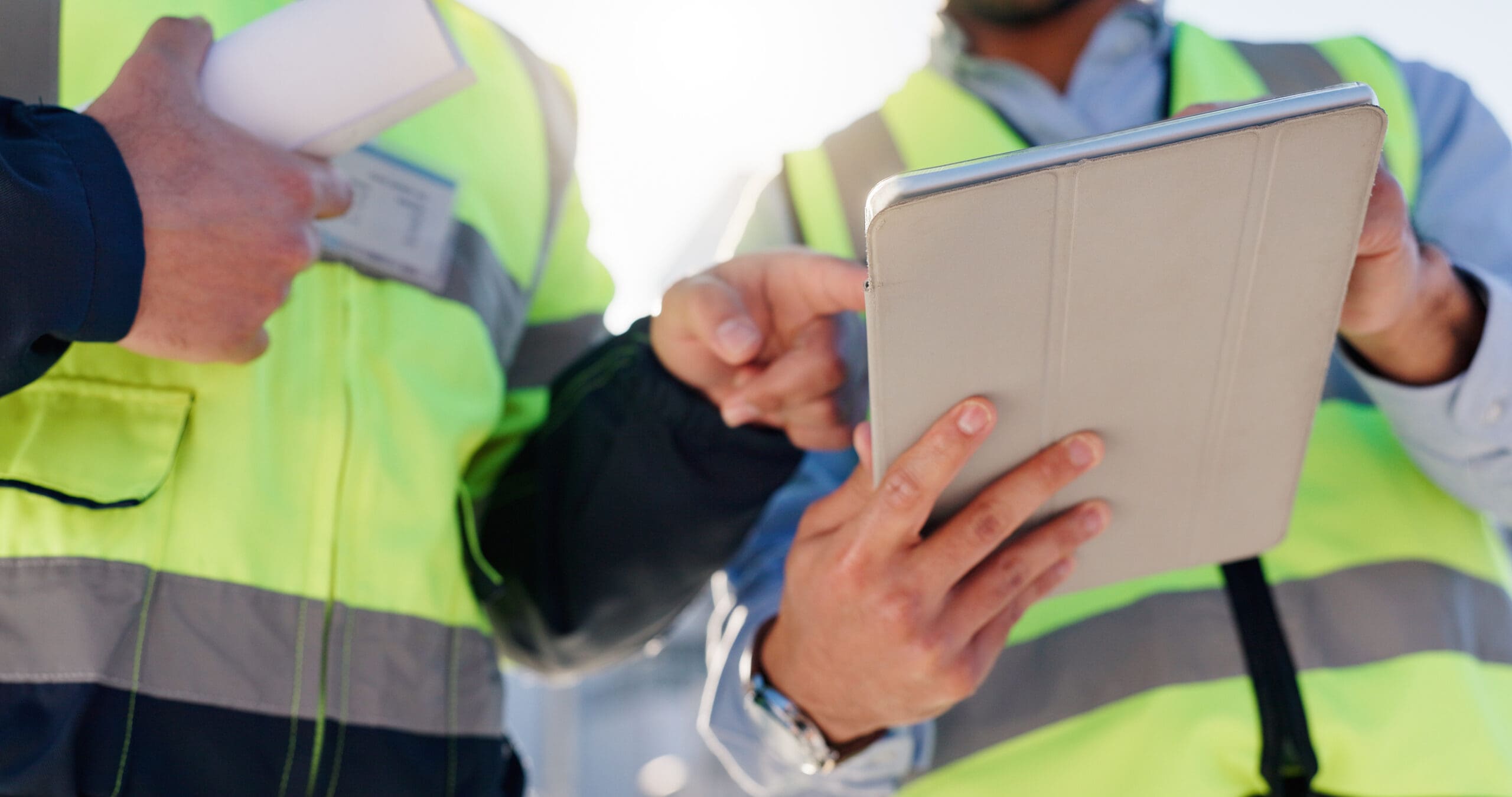 field workers with tablet and devices